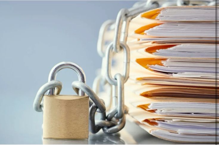 Family-owned hotel owners reviewing financial plans